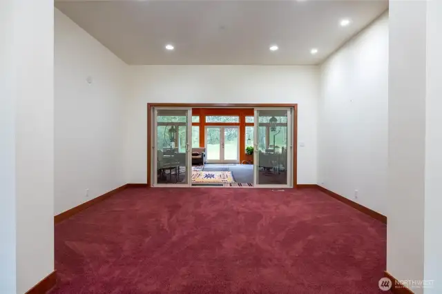 Large room looking to enclosed back room