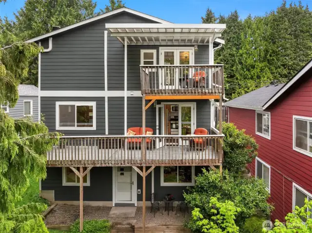 Welcome Home! Tucked into a quiet West Seattle street, this beautifully upgraded home offers seamless indoor-outdoor living, modern comforts, and a spacious layout across three levels.