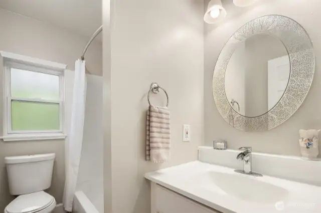 Upper guest bathroom thoughtfully designed to meet all of your guests' needs.