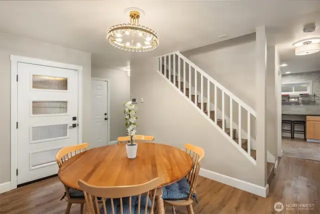 Just off the front entry, you’ll find a remodeled open stair wall, dedicated dining space, and convenient storage closet — all designed with daily living in mind. The hardwired security system panel is located right by the front door for easy access and added peace of mind.