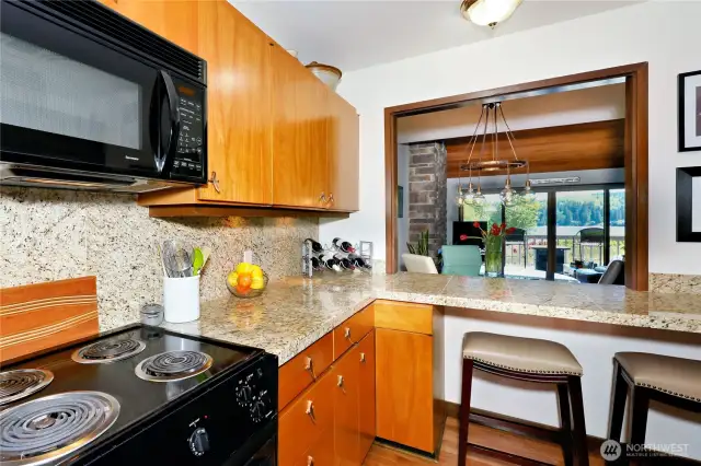 This clever condo opened has bar seating inside the kitchen so you can look at the view while you enjoy a meal.