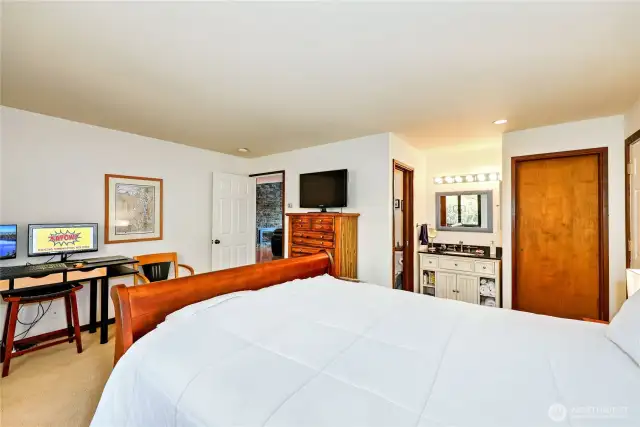 The guest ensuite has it's own full bath and an entrance to the outside. The HOA allows for short-term rentals- you could actually rent out just this room for a nightly rental and remain in your condo space simultaneously.