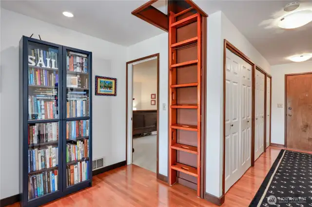The front door is on the right, the captains' ladder leads to the loft, and the door on the left opens into the guest ensuite with a full bath and exterior door. You can rent out the whole condo, or just the guest ensuite nightly!