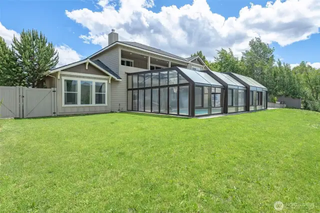 Fully retractable DynaDome pool enclosure.