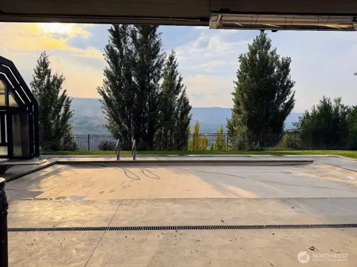 retracted enclosure, fully closed, wide open or sides only open with roof still covering pool.