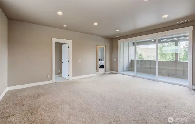 Huge heated balcony with amazing views out of the upper family room