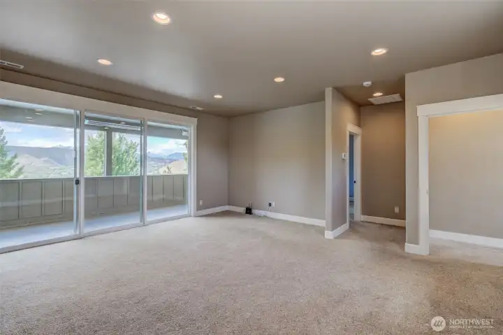 Upper family room, between 3 additional bedrooms and 2 baths.
