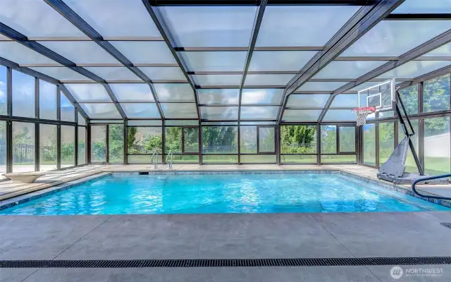 Gorgeous Rookard built, heated custom pool with automatic cover and swim jets