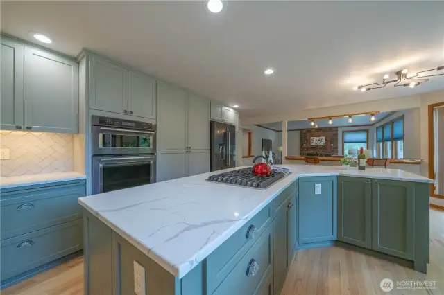 View of the island...looking toward the breakfast bar and family room.  Great place to cook and still be part of the party.