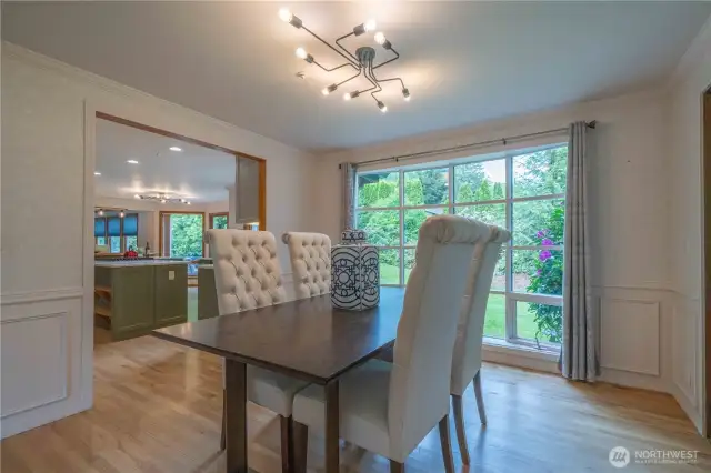 Spacious dining room a view of the backyard.  Opens to the kitchen.  Great place to entertain.
