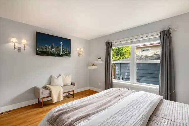 Primary bedroom large enough for relaxation and comfort.