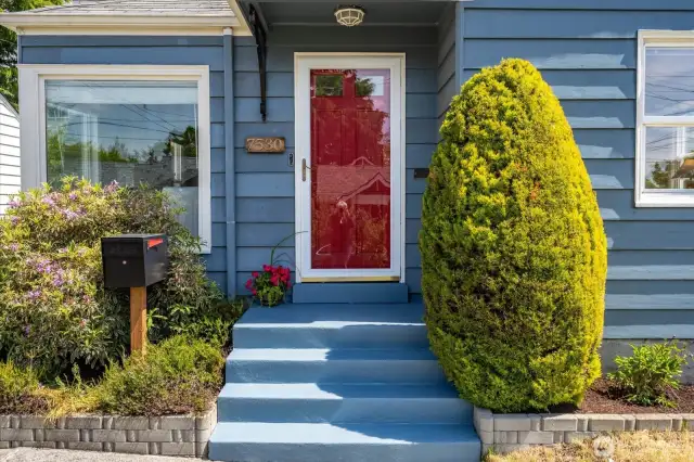 Striking red door combines timeless style and charm.