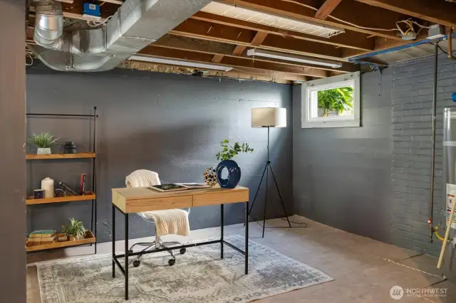 Lower level, heated basement is versatile space perfect for a stylish and productive home office setup.