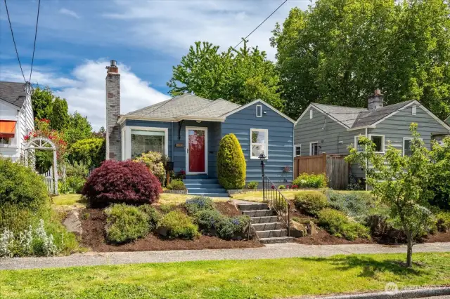 Beautifully landscaped home with all the charm and splendor!