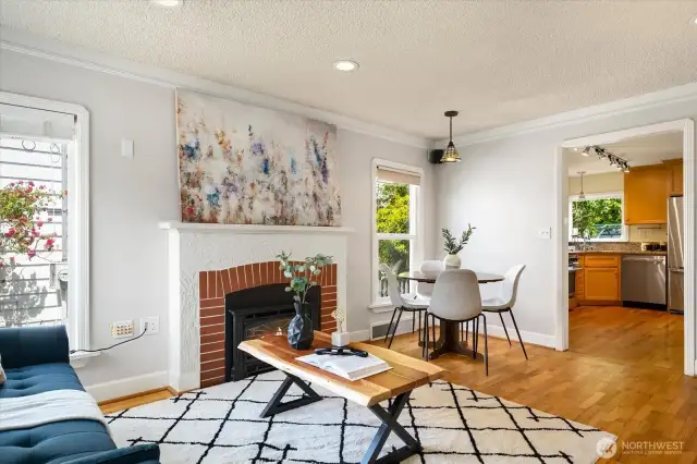 Spacious open-concept living with the living room and dining spaces that seamlessly flow to the Kitchen. Gas fireplace adds warmth and ambiance to the space!