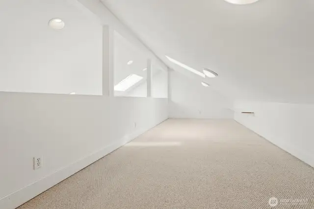 Loft over the bonus room is great for play area or storage.