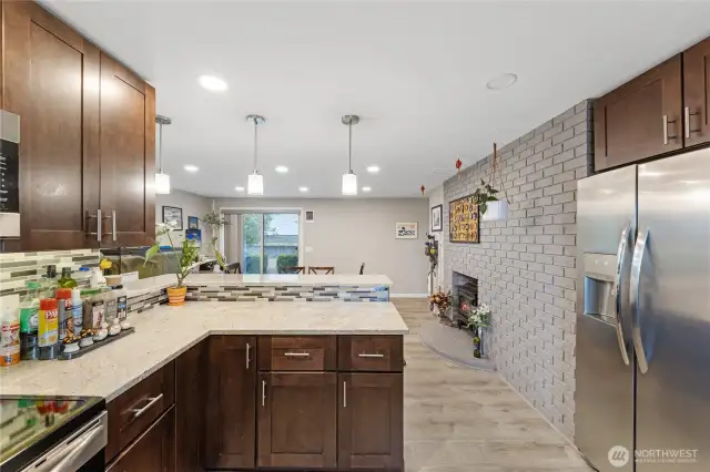 Seamless flow from kitchen to dining room for gatherings and meal prep.