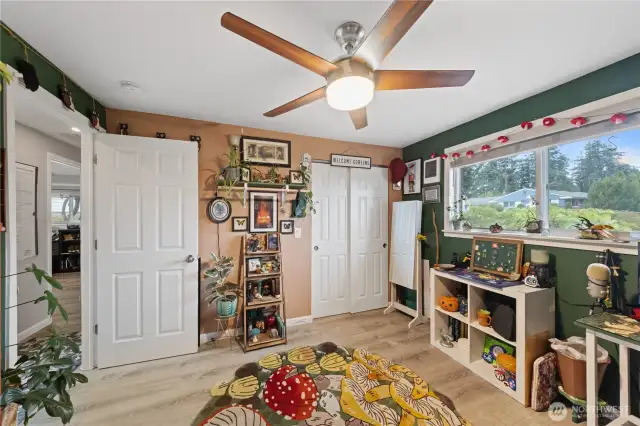 Bedroom three functions as a home office with flexible layout.