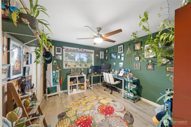 Another look at the versatile third bedroom used as a home office ideal for remote work or study.