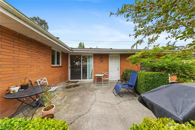Dining room opens to a concrete patio perfect for a bistro table or full patio set.