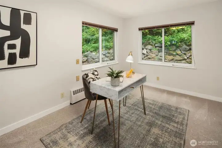 Shown here as an office, this 2nd bedroom on the main floor has it's own bathroom.
