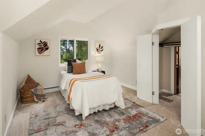 Upstairs bedroom with hidden room through the closet.