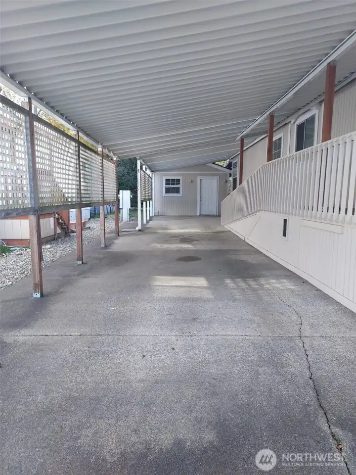 Long spacious carport.