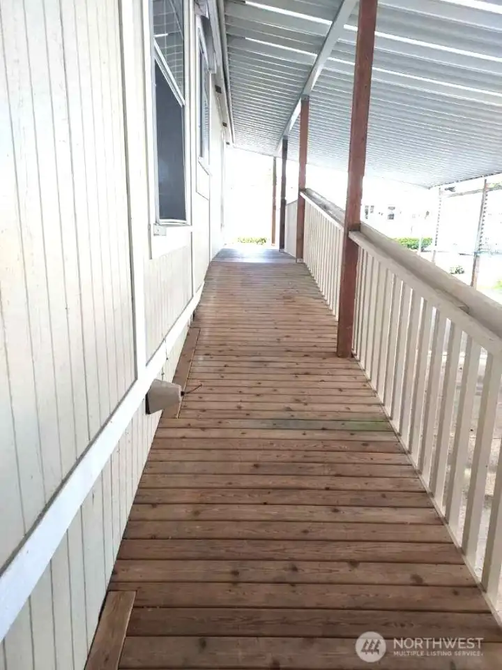 Ramp from the carport to the front door.
