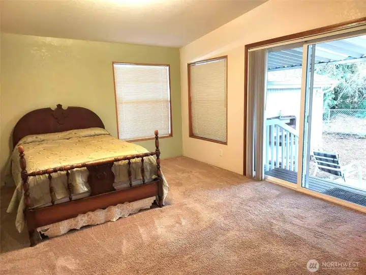 Primary with sliders to the back yar.