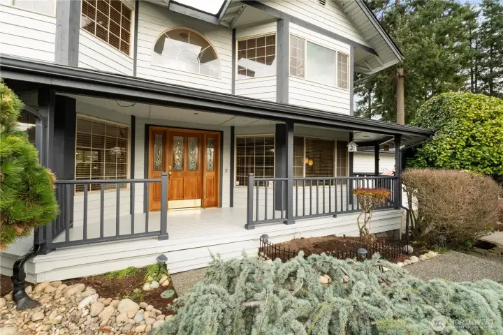 The covered front porch is a great area to greet your guests!