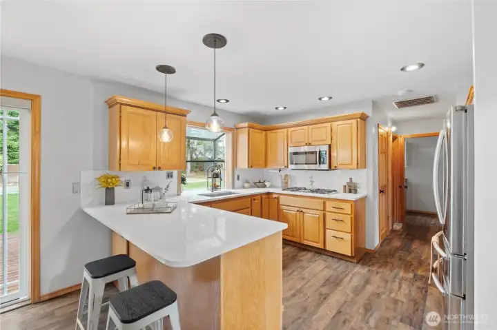 Beautiful new quartz countertops and tile backsplash!