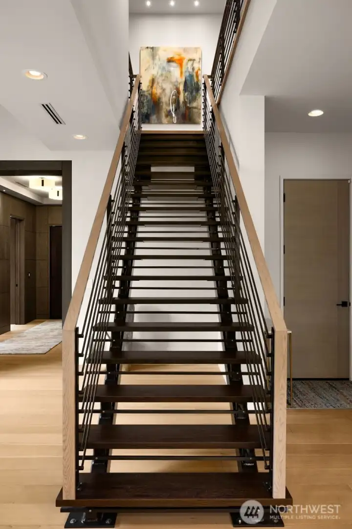Custom designed steel staircase with solid wood treads.