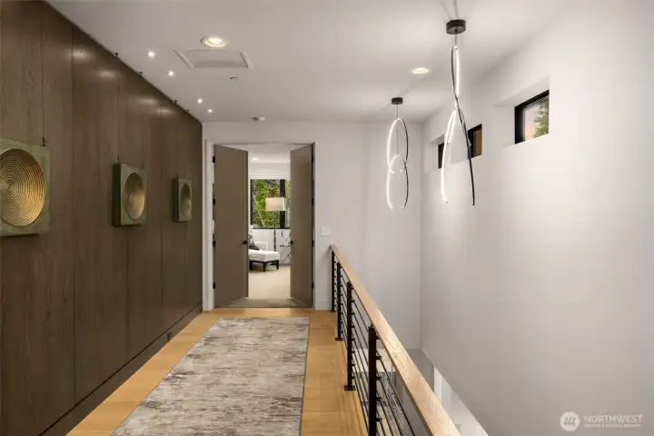 Continued white oak paneling and designer lighting.