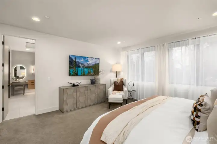 Spacious and luxurious primary suite.