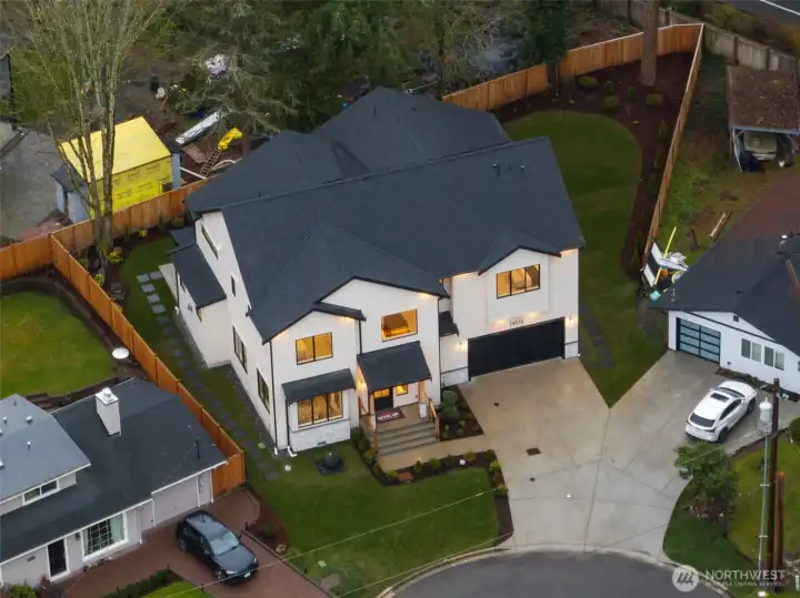 Aerial view of this beautiful custom home with lots of room.