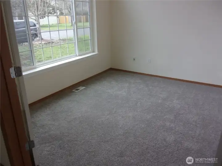 Den on the main just off the entry.