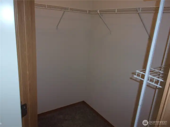 Walk-in closet in off primary bath.
