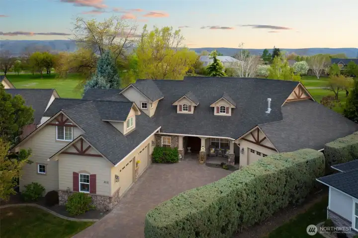 3 car garage, decorative gable beams + heat tape to protect roof & home in winter.