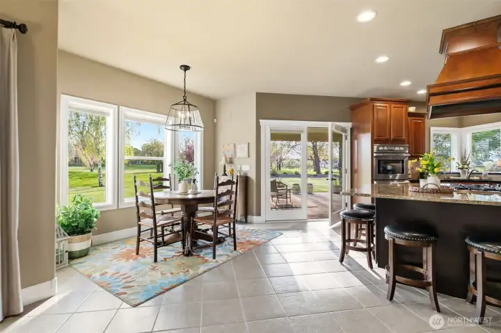 Breakfast nook/casual dining area adjacent to the kitchen.