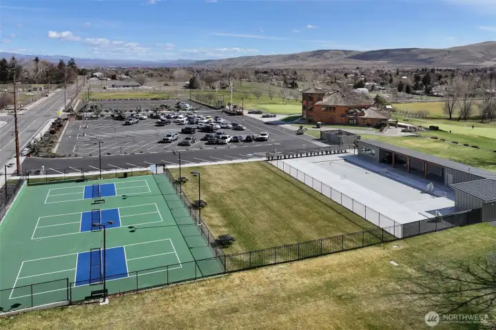 Community pickleball courts, pool, hot tub, and cabana for resort-style enjoyment