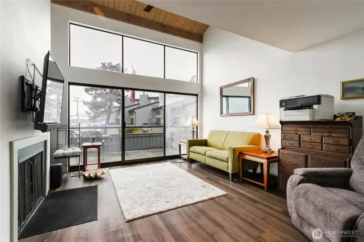 Living room, sliding door going to sundeck overlooking gardens and Birch Bay