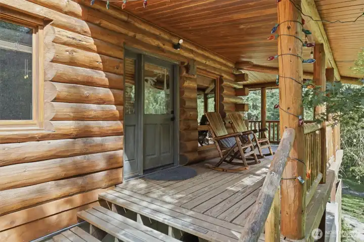 Welcome to serenity enjoy the covered wrap around porch year round.