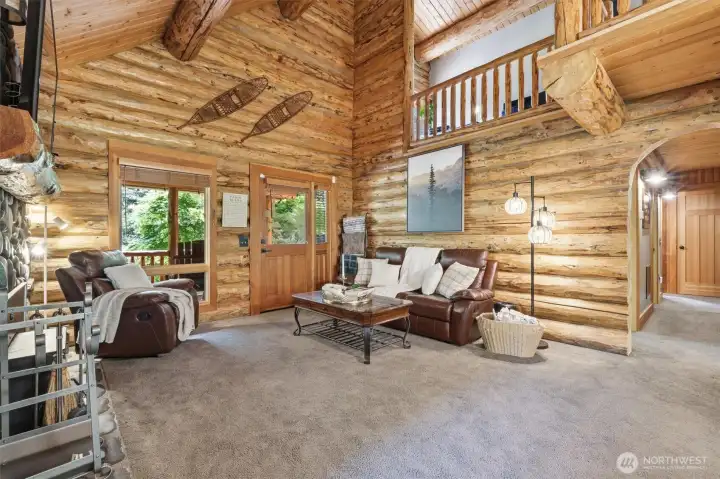 Open and inviting living room with easy outdoor access to your covered wrap around porch
