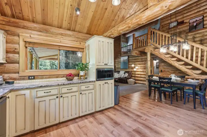 Beautiful kitchen with so many windows bringing the outdoors inside