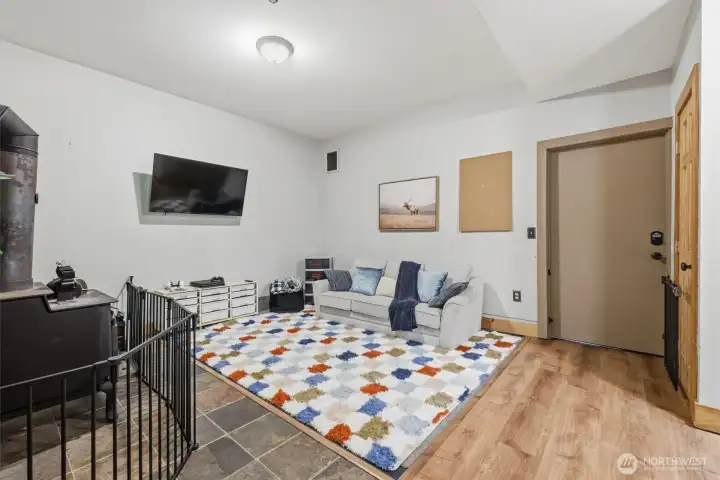 Finished basement with additional fireplace separate access to the yard and tons of extra storage.