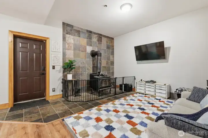 Finished basement with additional fireplace separate access to the yard and tons of extra storage.