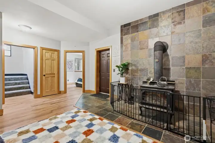 Finished basement with additional fireplace separate access to the yard and tons of extra storage.