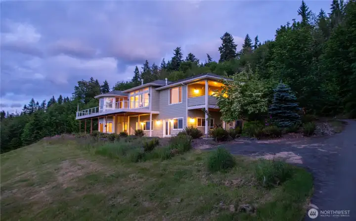 A 10-acre retreat where nature surrounds you and from every window, stunning views of the Strait of Juan de Fuca and Victoria, BC beyond fill the frame. A 10-acre retreat where nature surrounds you and from every window, stunning views of the Strait of Juan de Fuca and Victoria, BC beyond fill the frame.