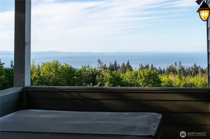 Access from the primary suite to the hot tub on the covered deck and amazing views!