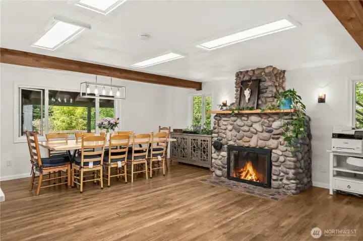 Beautiful stone fireplace in large dining room area